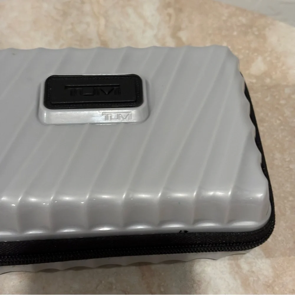 Tumi hard suitcase style cosmetic case